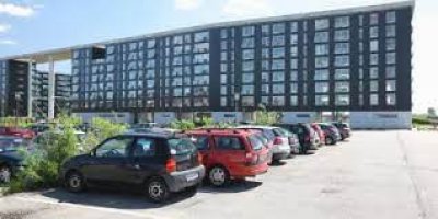 parking lot in front of modern building