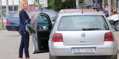 woman next to her car